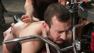 Muscled mechanic, bound, fucked from both ends
